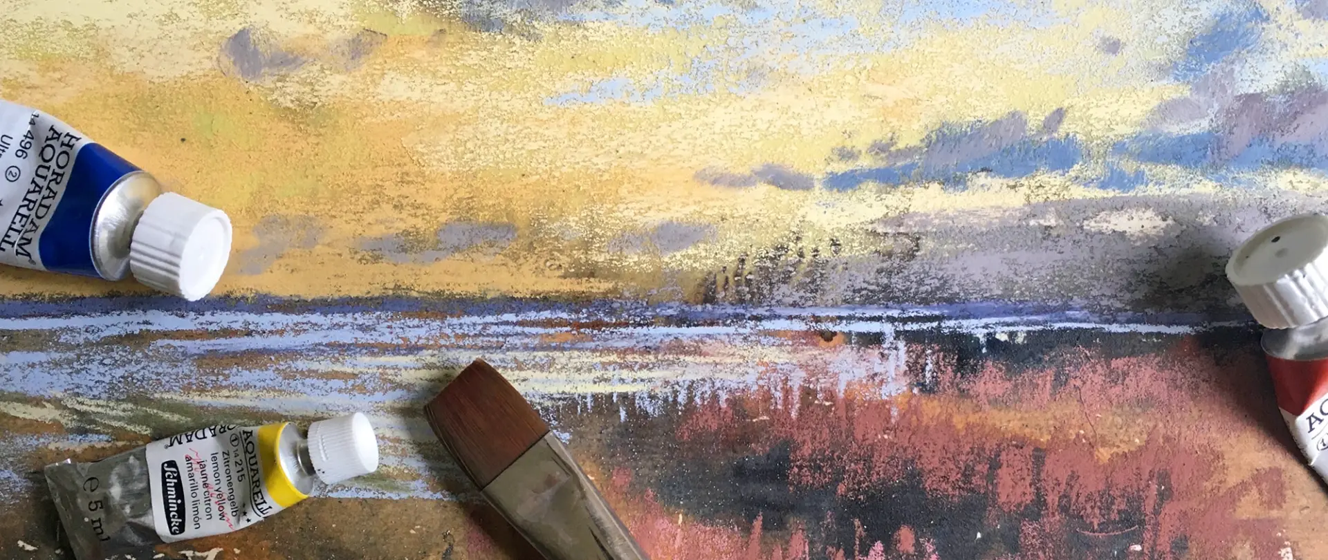 Leinwand mit Farbauftrag in Pastelloptik, Acrylfarben und Pinsel für den Kurs Nassuntermalungen unter Pastell