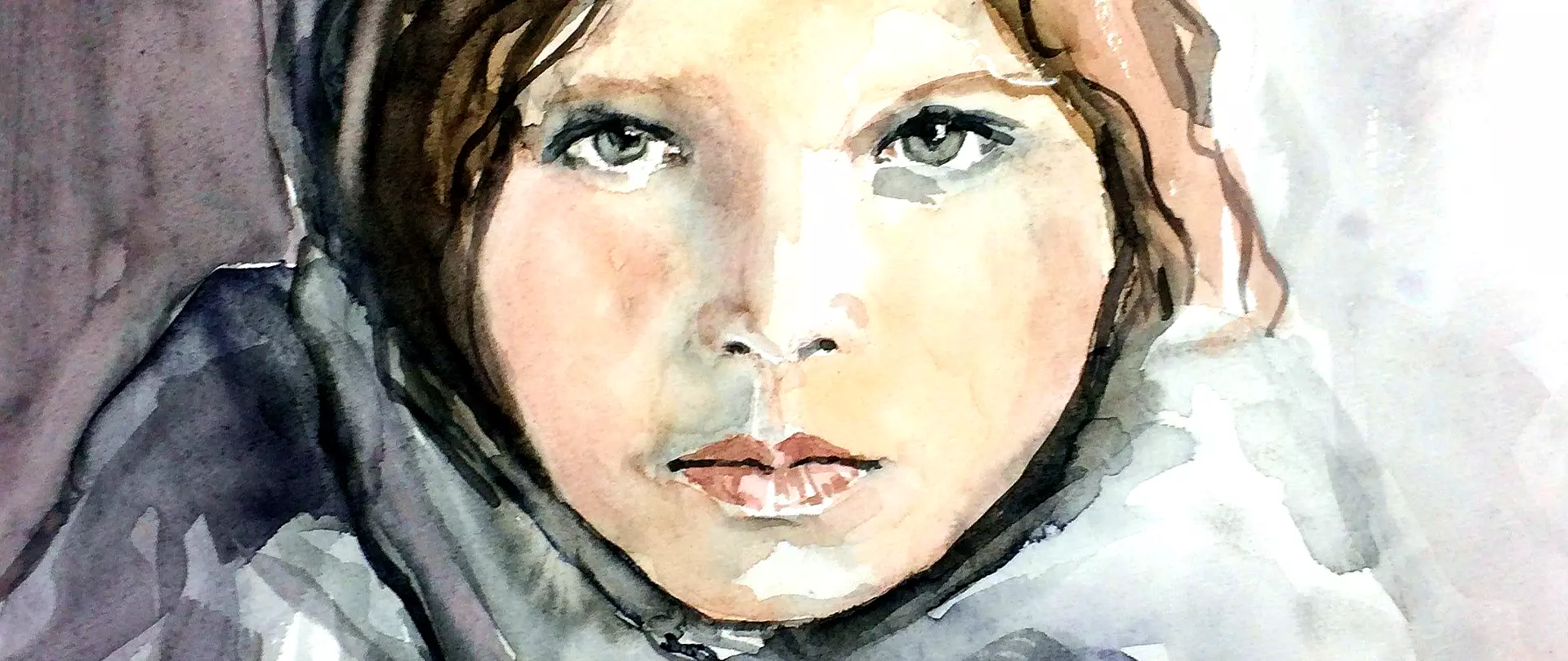 Kinderporträt in Aquarell mit großem Blickfang auf die leuchtenden Augen – gemalt von Brigitte Guhle
