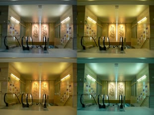 Verschiedene Weißabgleich-Einstellungen. Von links oben nach rechts unten: Auto WB; sonnig; Blitz; Glühbirne. Foto: »Metrostation-Sofia-University-white-balance-collage« by Spiritia (CC BY-SA 3.0 - http://www.creativecommons.org/licenses/by-sa/3.0/). Eine Collage, bestehend aus viermal demselben Motiv. In jedem einzelnen Bild sticht jedoch eine andere Farbe heraus.